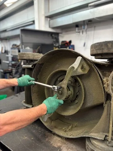 Figure 1: One of our skilled technicians removing a badly worn blade